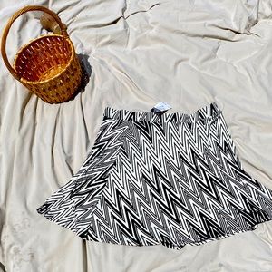Cute black and white striped skirt.  New with tags